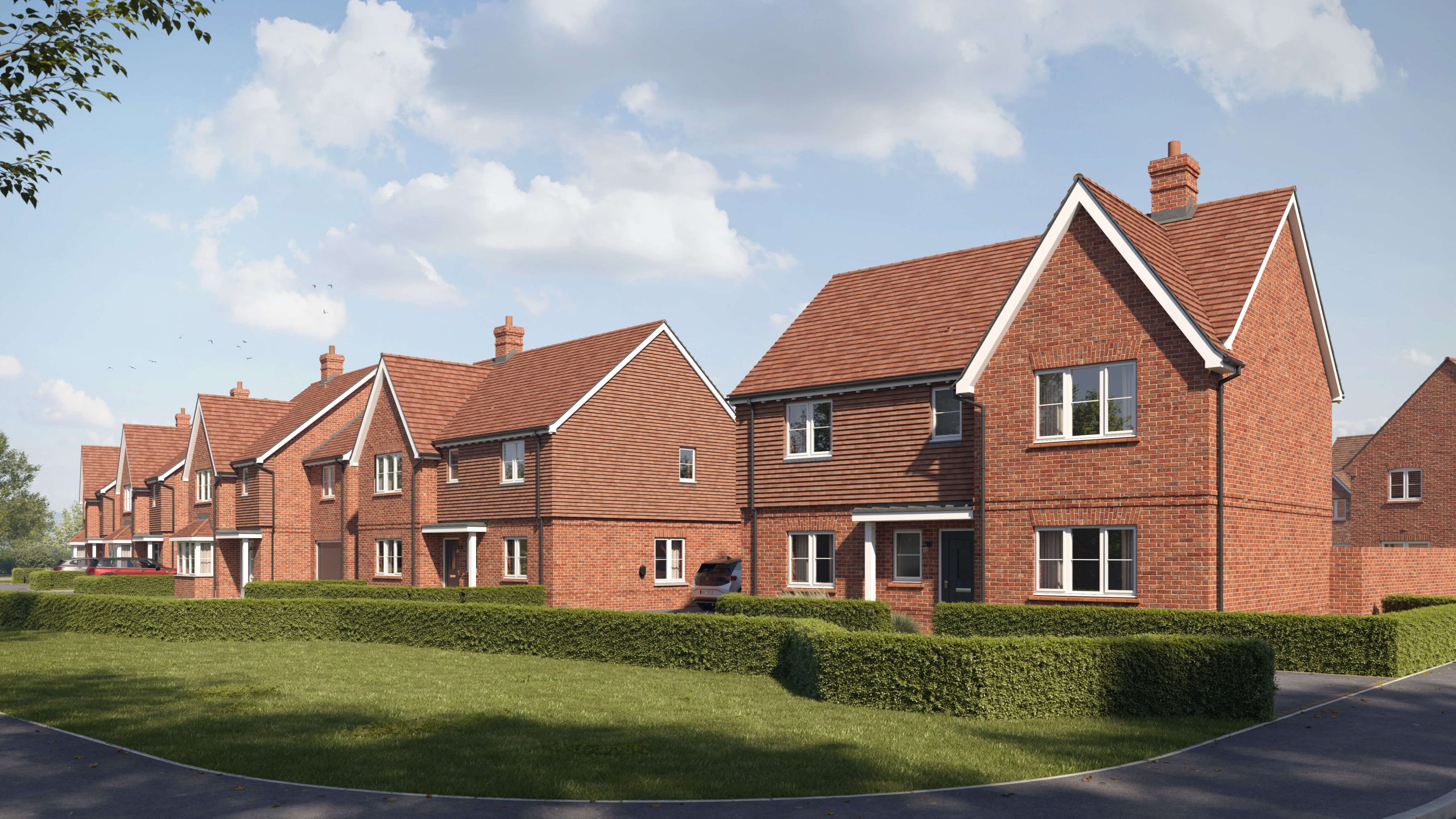 Street view of Bargate Homes residential development with detached family houses
